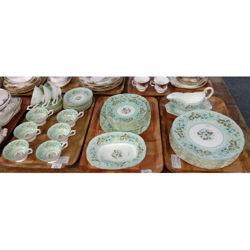 306 - Three trays of Coalport 'Strange Orchid' English bone china dinner and teaware to include: various s... 