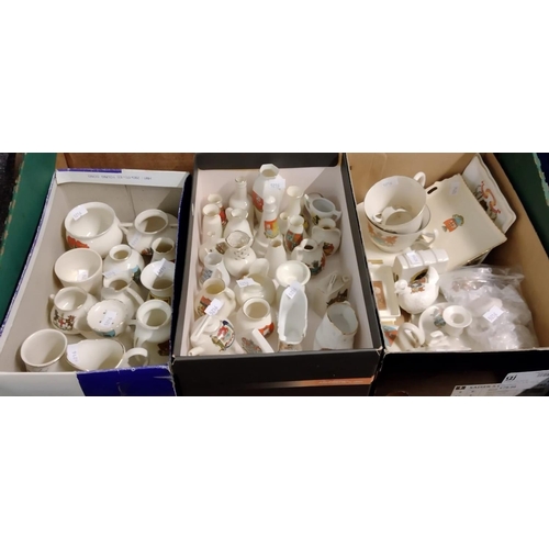 326 - Box of china souvenir crested ware items to include: shoes, house, miniature ewers, jugs and urns, t... 