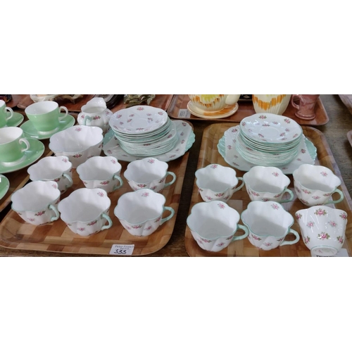 333 - Two trays of Shelley 'Rosebud' design English fine bone china teaware, to include: teacups, saucers,... 