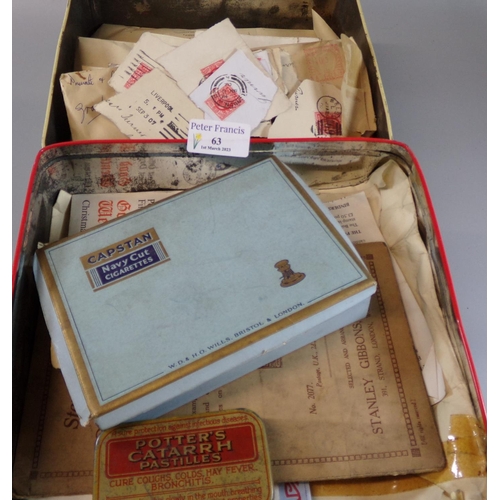 63 - All world collection of stamps in envelopes, packets and loose in two old biscuit tins.   (B.P. 21% ... 