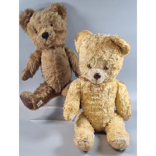 109 - Two vintage Teddy Bears, one with plastic nose, one with stitched nose and canvas pads.  The darker ... 