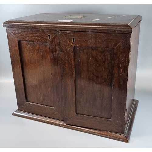 72 - Early 20th century oak two door smoker's cabinet with fitted interior.  36cm wide approx.  (B.P. 21%... 