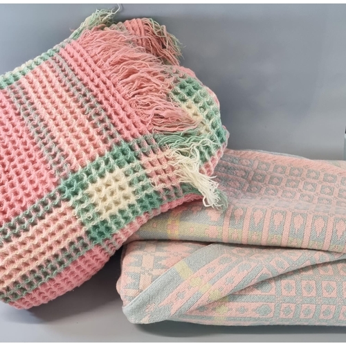 92A - Two vintage woollen blankets or carthen, one is a Welsh tapestry pale pink ground and the other is a... 