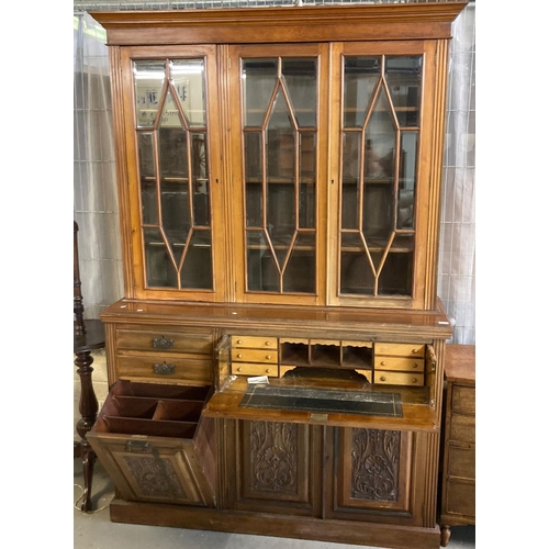 439 - Late 19th century walnut two stage secretaire bookcase, the moulded cornice above three astragal gla... 