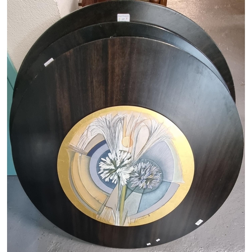 157 - Ernitie Jong, three hand painted circular hardwood table tops/hanging panels with stylised floral pa... 