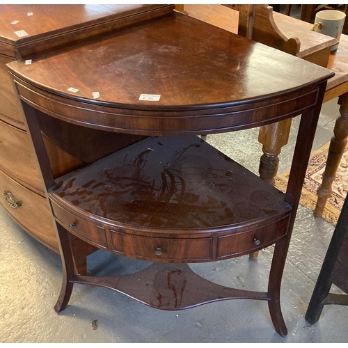 446 - 19th century mahogany bow front corner wash stand, having two tiers with single and dummy drawers on... 