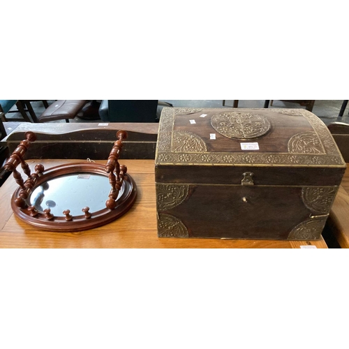 451 - Small wooden and metal bounded dome shaped trunk/casket together with a small oval mirror flanked by... 