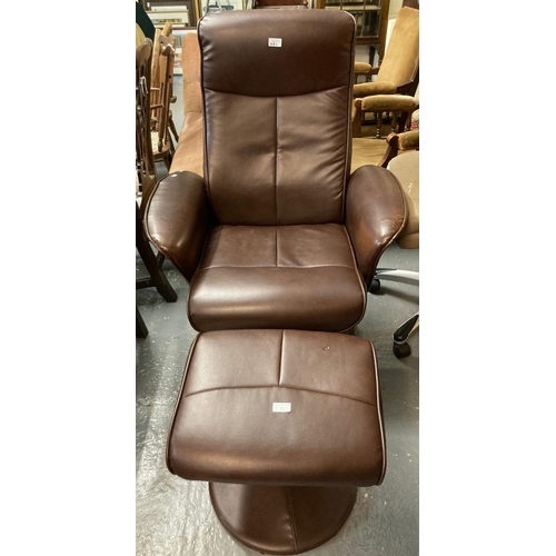 487 - Modern leather swivel armchair with matching stool.  (B.P. 21% + VAT)