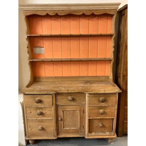 501 - Victorian pine two stage rack back dresser, the moulded cornice above fitted shelves and boarded rac... 