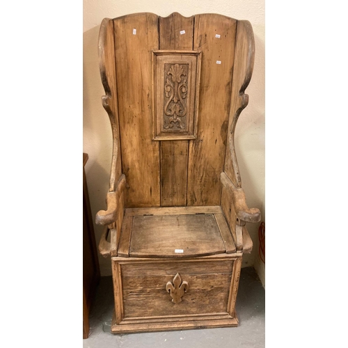 508 - Unusual 19th century pine high back lambing/porters chair with hinged box seat and ornate carved pan... 