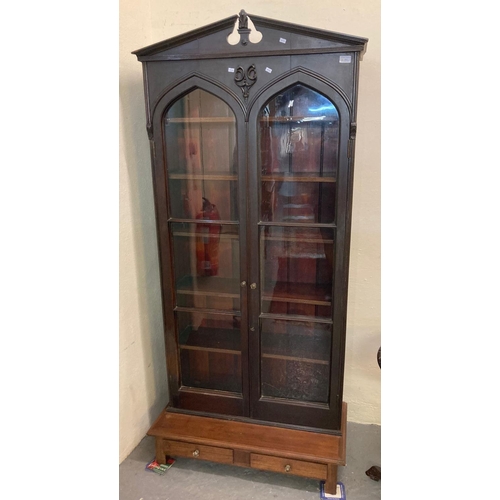 513 - Unusual stained Gothic design two door glazed bookcase on associate base/stand.   (B.P. 21% + VAT)