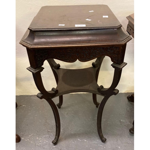 516 - Edwardian stained mahogany lamp table/jardinière having carved frieze above an under tier on outswep... 