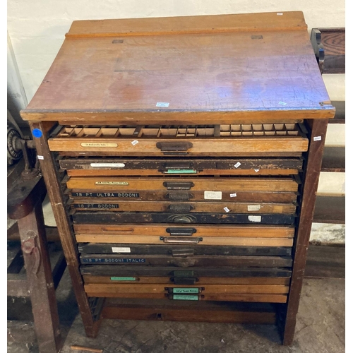 553 - Vintage pine type setters desk with fitted drawers below marked 'Stephenson, Blake & Co.'.  96cm wid... 