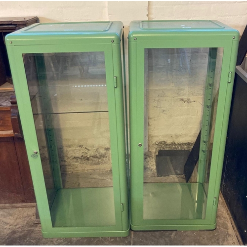 572 - Two metal pharmacy type cabinets with adjustable glazed shelves.  50cm wide approx.  (2)  (B.P. 21% ... 