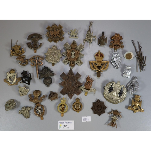 299 - Bag of assorted British military and other cap badges.   (B.P. 21% + VAT)