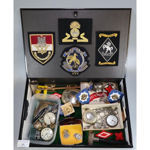 304 - Box of assorted militaria items: pocket watches, penknives, gob watches, military blazer badges, can... 