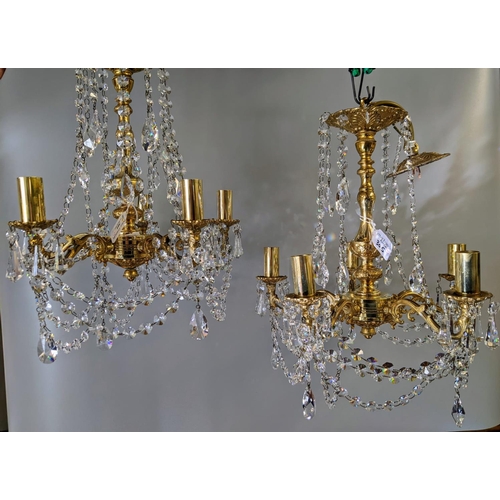 305 - Pair of modern brass finish five section lustre candelabrum ceiling light fittings with glass drople... 