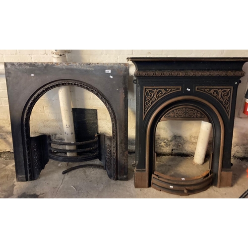 578 - Late Victorian cast iron mantelpiece fire insert together with another.  (2)   (B.P. 21% + VAT)