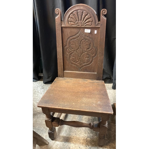 582 - 17th century style carved oak low side chair with arched back.  (B.P. 21% + VAT)