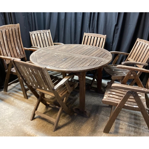 585 - Modern teak garden set comprising: two high backed folding chairs and four folding elbow chairs arou... 