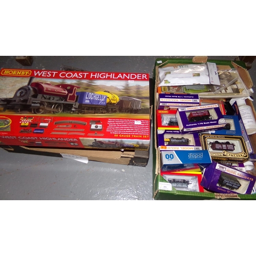 406 - Hornby OO gauge West Coast Highlander train set in original box with loose track and other model rai... 