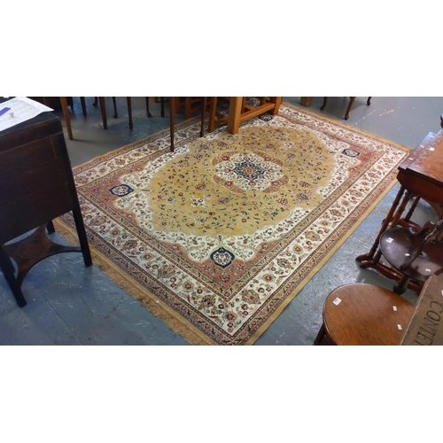 593 - Modern Persian design floral and foliate rug on a beige ground with central flowerhead medallion.  3... 