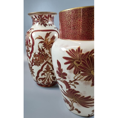 137 - Pair of late 19th early 20th century Doulton Burslem Art Ware vases of baluster form on a cream grou... 