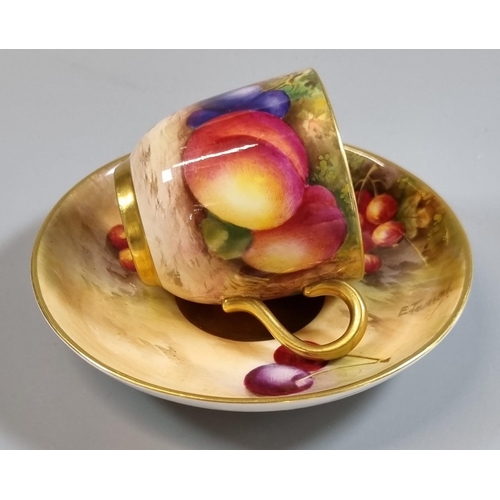 143 - Royal Worcester porcelain demi-tasse hand painted with fruit with a gilt interior, signed E Townsend... 