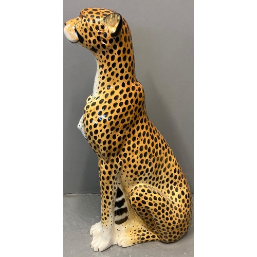 155 - Modern ceramic handpainted study of a cheetah with naturalistic features, in seated pose.  Probably ... 