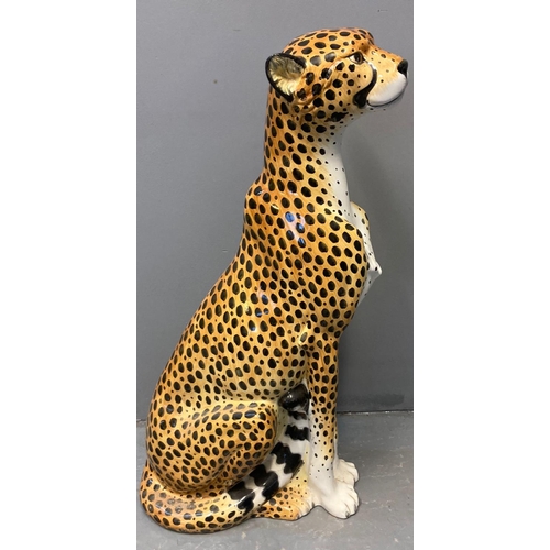 155 - Modern ceramic handpainted study of a cheetah with naturalistic features, in seated pose.  Probably ... 