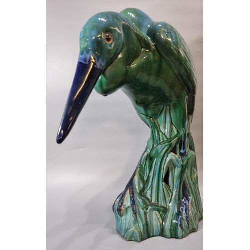 156 - Unusual Majolica pottery study of a Heron in a natural setting of reeds, in stooped pose.  67cm high... 