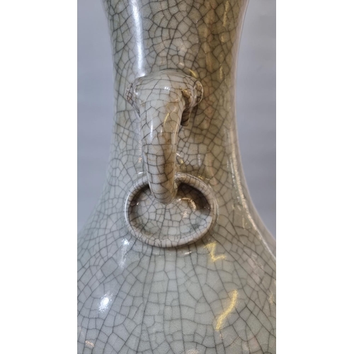 160 - Large Chinese celadon stoneware baluster vase on a crackle glaze ground with elephant mask ring hand... 