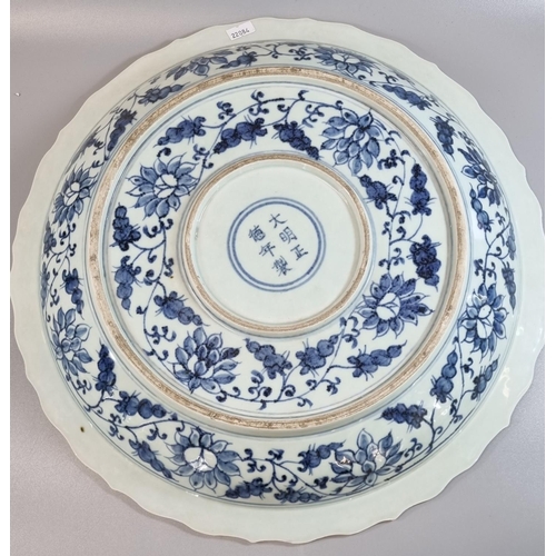 168A - Modern reproduction 16th Century style Chinese blue and white porcelain dish, overall decorated with... 