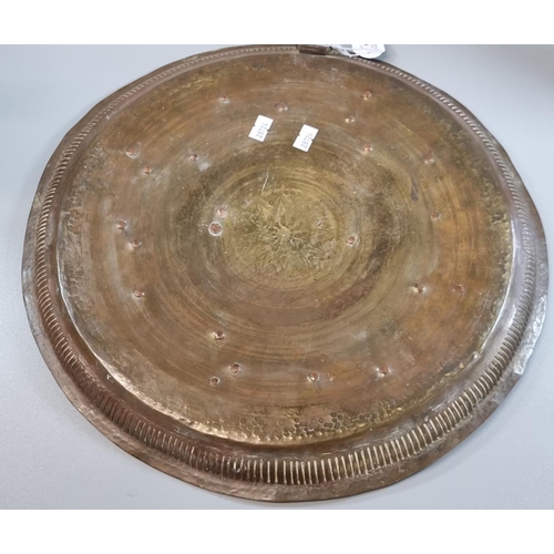 174 - 19th/20th century Indo Tibetan copper, brass and white metal circular tray with hammered and applied... 