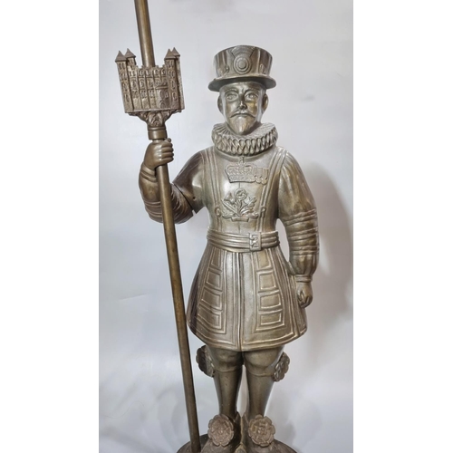 188 - Unusual early 20th century cast iron companion set in the form of a 'Beefeater', standing 83cm high ... 