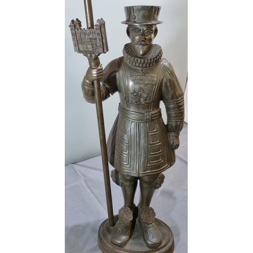 188 - Unusual early 20th century cast iron companion set in the form of a 'Beefeater', standing 83cm high ... 