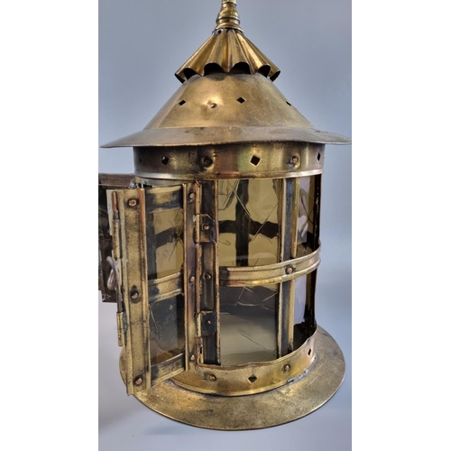 191 - Arts and Crafts design brass hall lantern, the fluted gallery above circular brass and glass panels,... 