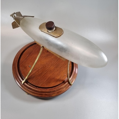 192 - Unusual novelty glass and metal decanter in the form of a stylised Zeppelin airship with miniature t... 