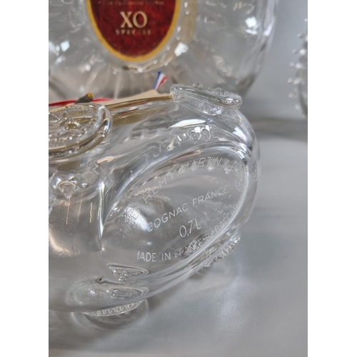 197 - Five similar Remy Martin Baccarat glass cognac decanters and stoppers, together with a larger fine c... 