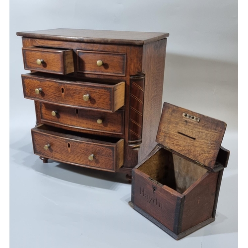 208 - 19th century oak miniature apprentice bow front chest of drawers, the moulded top above an arrangeme... 