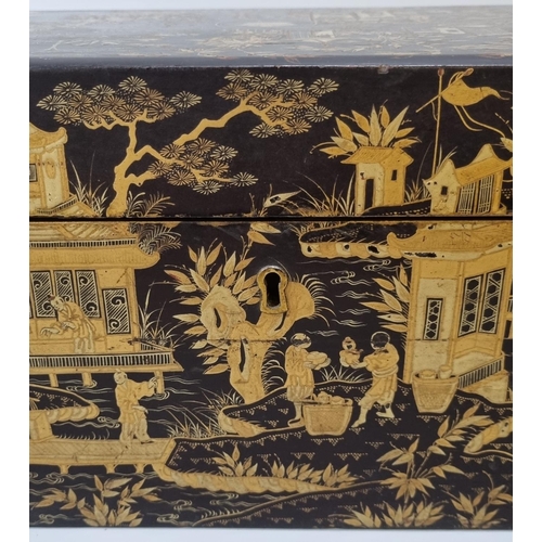 209 - 19th century chinoiserie decorated lacquered  and gilded writing box, having brass handles, the inte... 