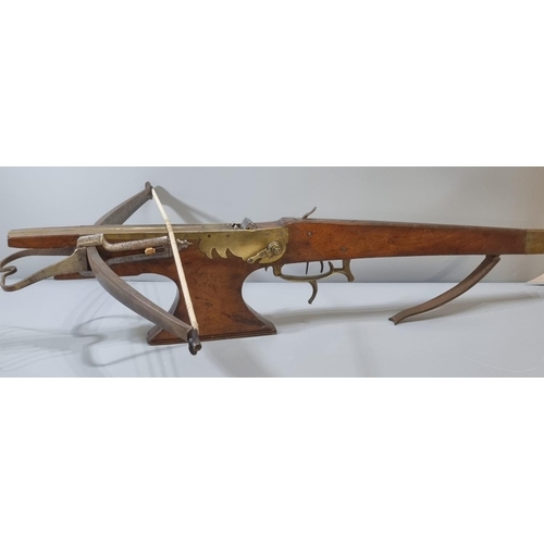 222 - Late 17th/early 18th century Flemish target crossbow with full walnut stock, having steel bow, retai... 