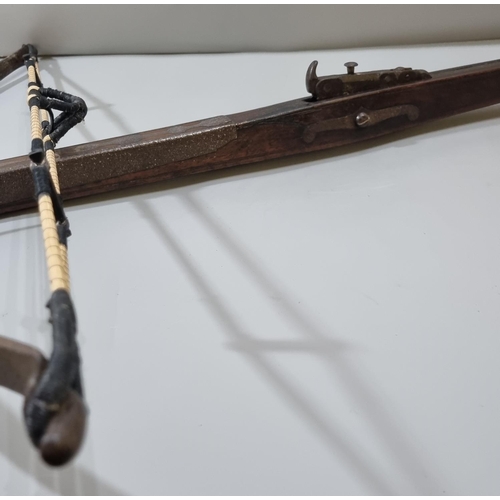 225 - George III English stone crossbow having mahogany stock, steel bow with hinged fork foresight, and s... 