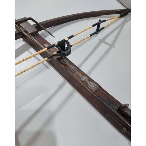 225 - George III English stone crossbow having mahogany stock, steel bow with hinged fork foresight, and s... 