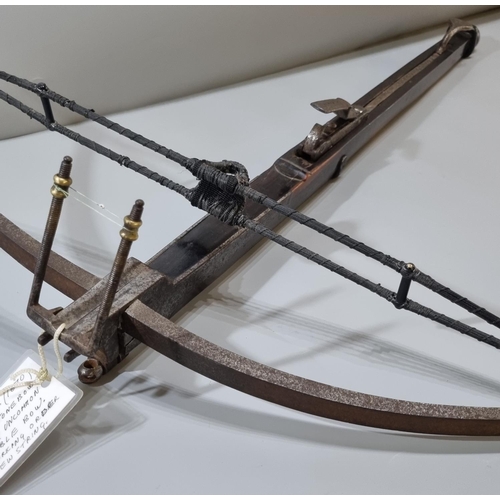 226 - 17th century English crossbow, having steel bow, guide and folding fork foresight, steel cocking lev... 