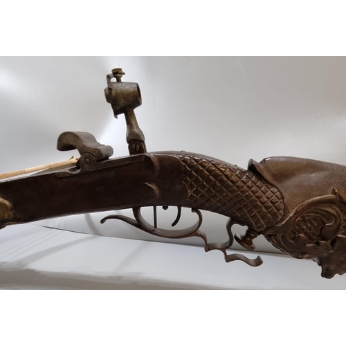 228 - 19th century, probably Swiss, target crossbow, having steel bow, heavily carved hardwood full stock,... 