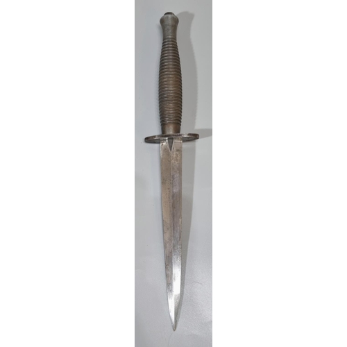 231 - A Fairbairn Sykes third pattern late WWII period fighting knife with A3 MoD inspection mark, and han... 