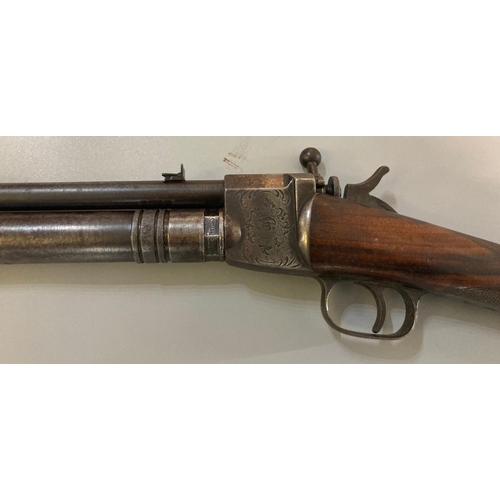 237 - 19th century Giffard patent 8mm hammer air rifle, having 24.25 inch barrel with fixed sights, scroll... 