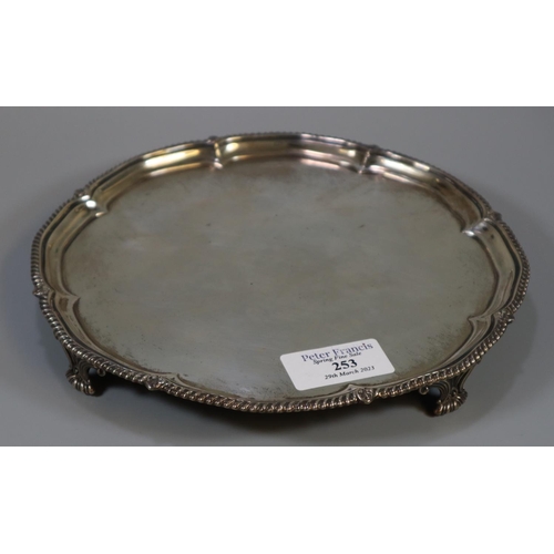 253 - Late Victorian silver pie crust salver with gadrooned edge standing on four shell feet by 'Harrison ... 