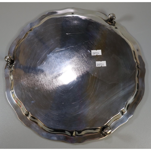 255 - Indian white metal presentation pie crust salver raised on three scroll feet, 'Hearty congratulation... 